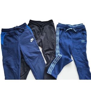 3 pairs of boys size 6-7 athletic pants. Umbro, Nike, and All in Motion.